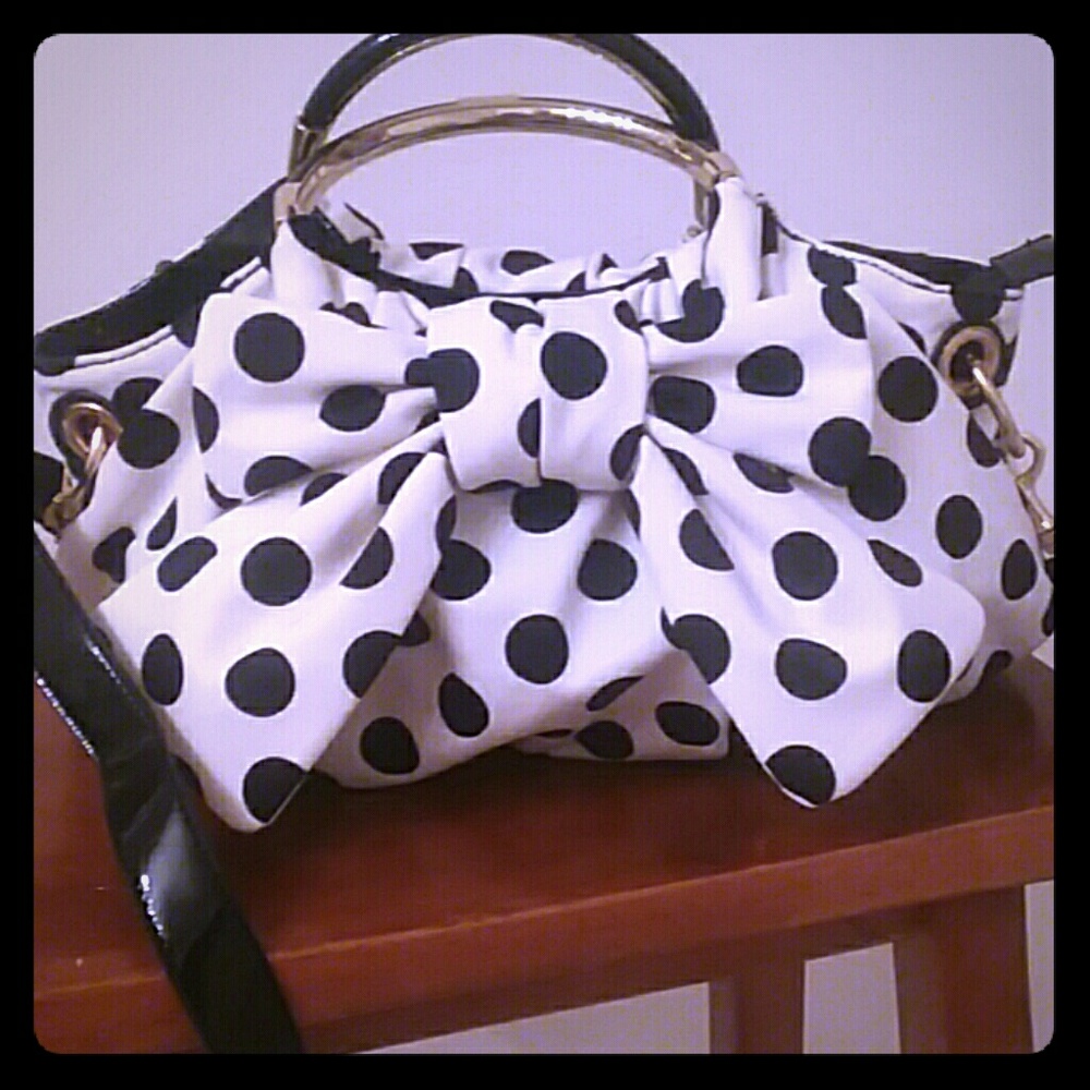 LuLu Guinness white purse withblack polka dots